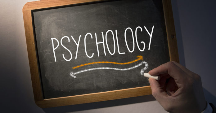 The word psychology written on a chalkboard